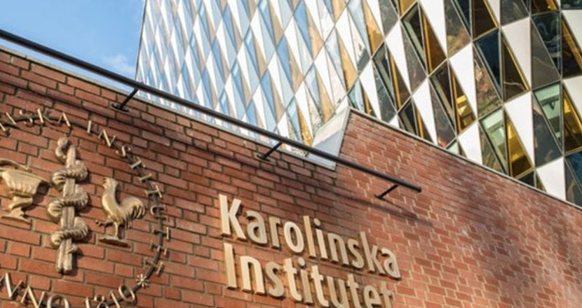 Delar av skylt och byggnader på Karolinska Institutet i Solna